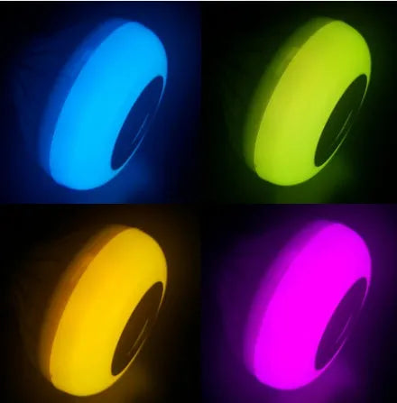 White E27 smart LED bulb with built-in Bluetooth speaker and remote control for colour-changing light.