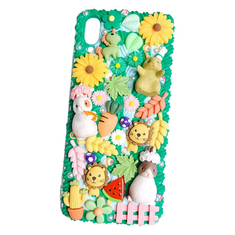Pink and green cartoon rabbit design 3D silicone iPhone case showing textured surface and precise model fit
