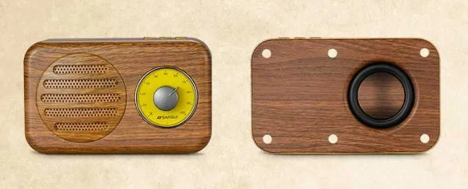Portable Bluetooth speaker with FM radio in wood colour finish showing front speaker grille and control buttons