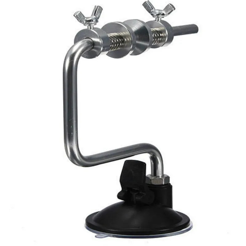 Silver aluminium fishing line spooler with suction cup base, adjustable tensioner, and anti-twist spool holder