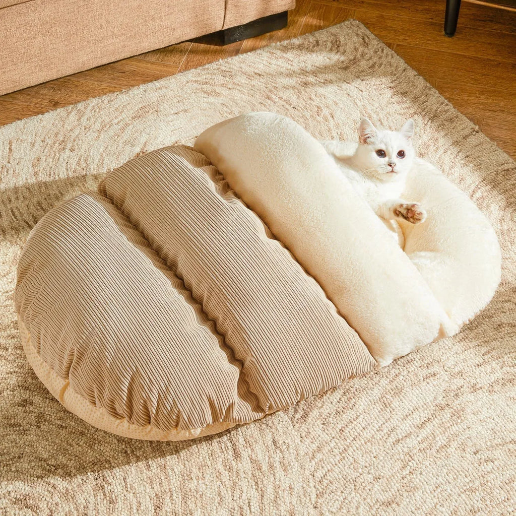 Grey slipper-shaped cat cave bed with plush lining shown both as an enclosed hideout and opened as a flat bed.