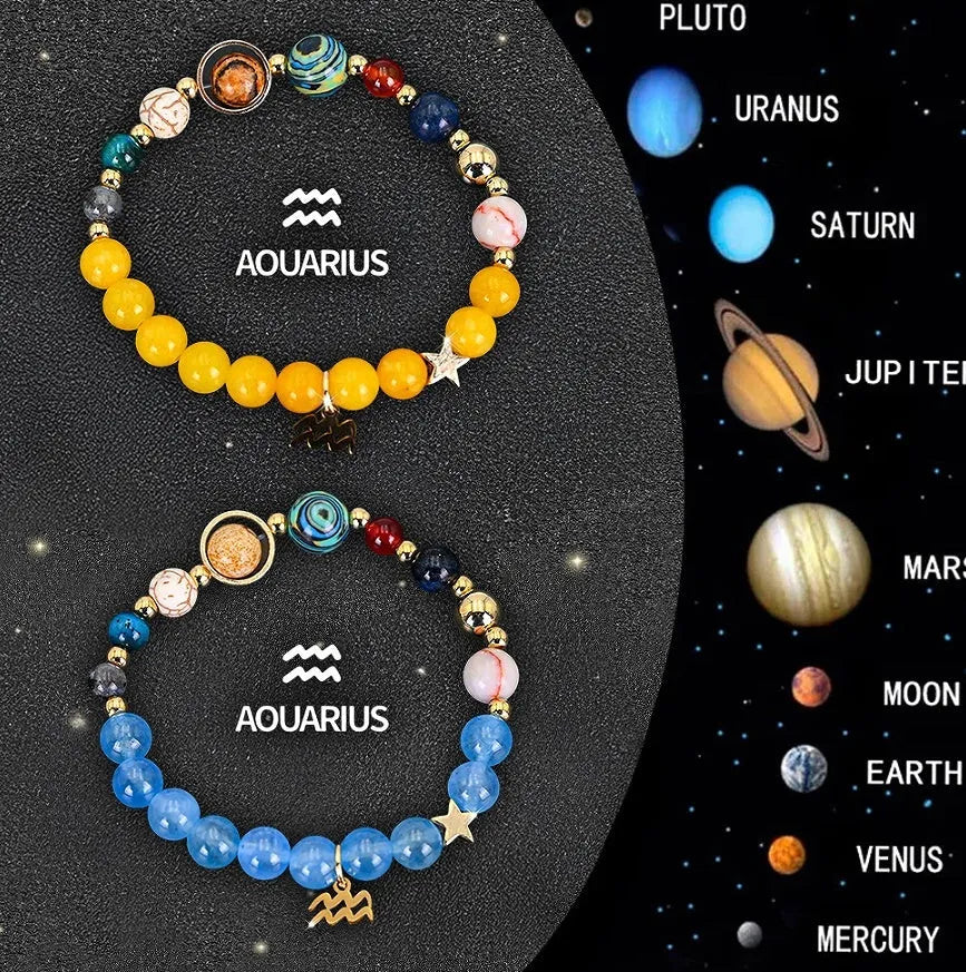 Two natural stone beaded bracelets for zodiac signs laid flat on a surface.