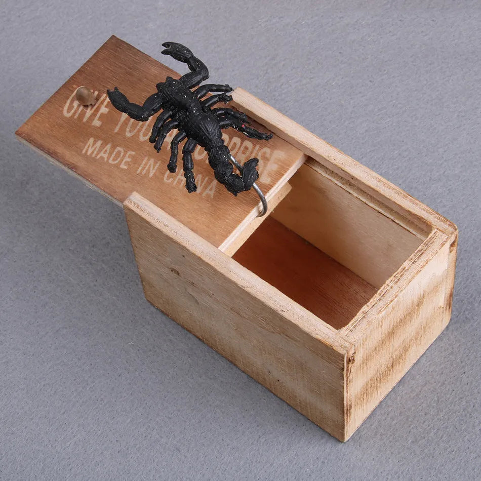Wooden prank scare box measuring 9.1cm with a random jumping animal surprise inside