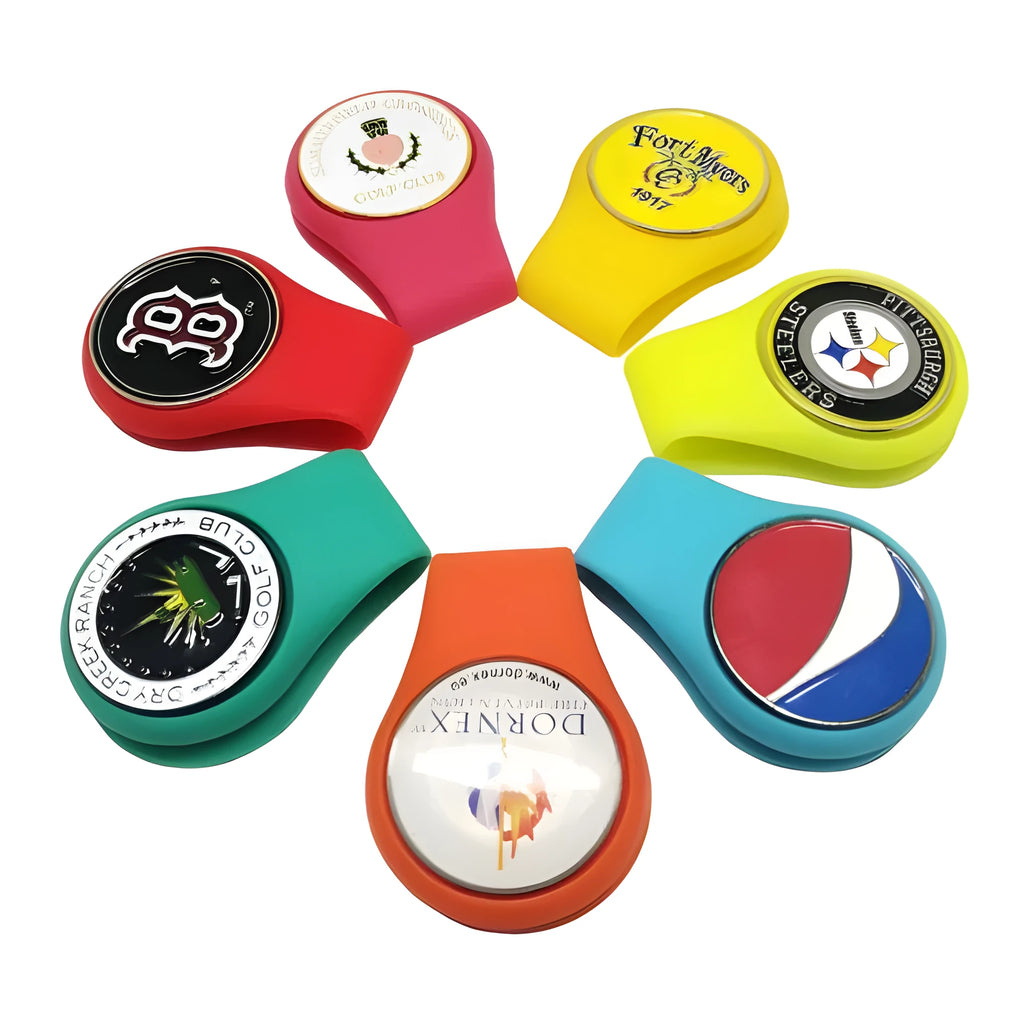 Silicone golf hat clip ball marker holder in ten colours, clipped onto a hat with a metal ball marker.
