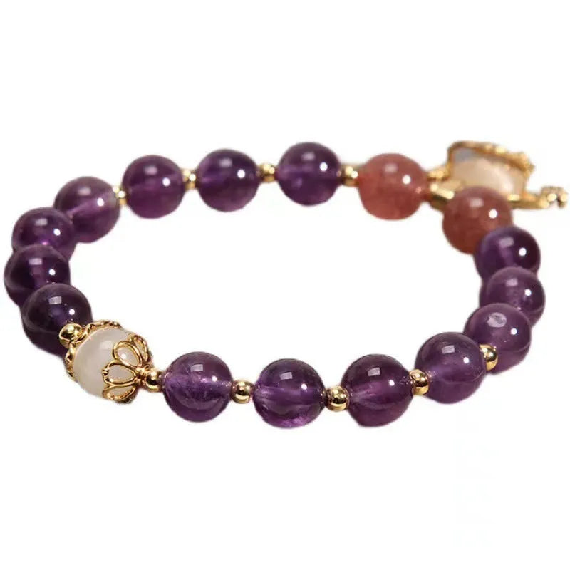 Handmade copper bracelet with natural amethyst crystal and gold longevity lock charm