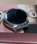 Silver wireless smart sports watch with touch screen showing health monitoring icons