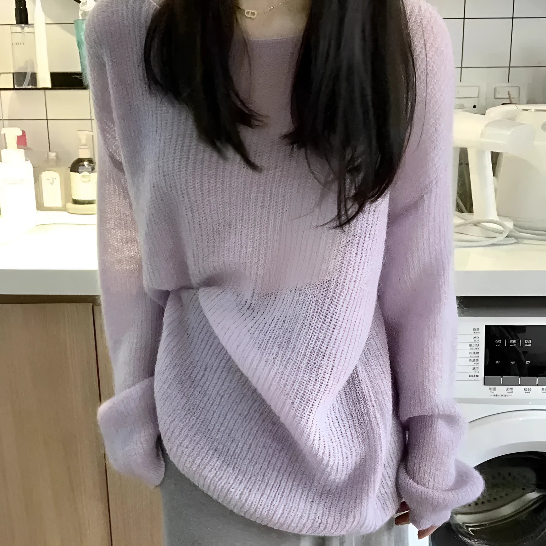 Purple sleeveless women's blouse with round neck, shoulder straps, and hollow-out ice silk fabric.