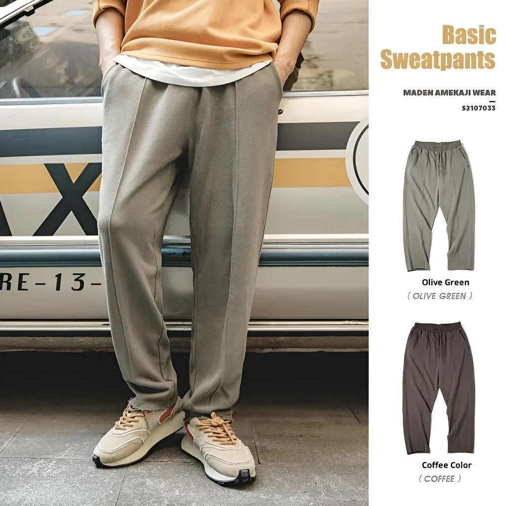 Men's cotton knitted sweatpants in olive green with tapered 3D cut hemming, straight leg retro style