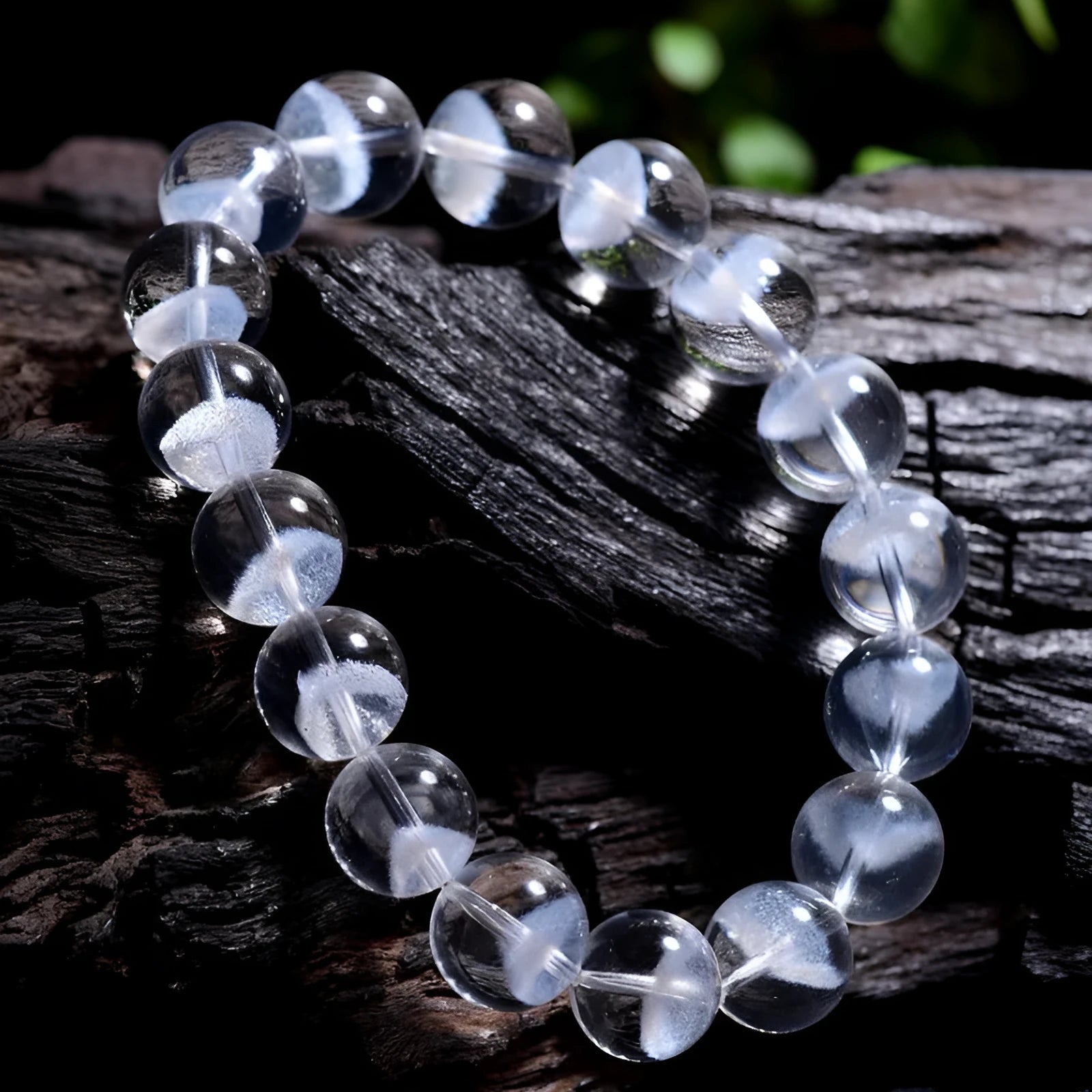 Women's white crystal bracelet with natural ghost pyramid shapes and Ruyi design elements