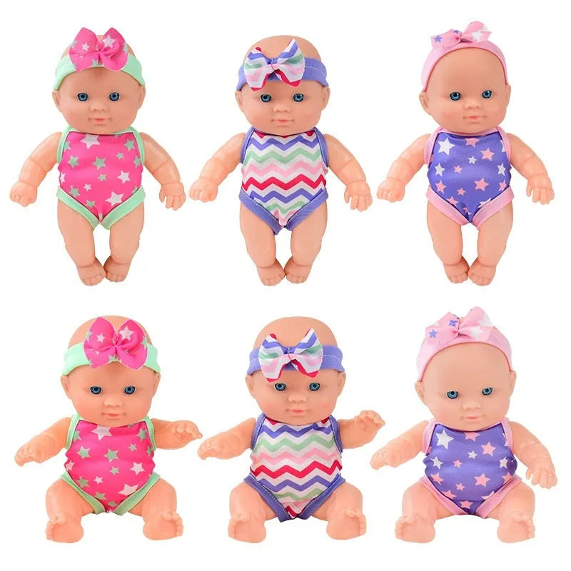 Vinyl baby figurine doll with movable limbs showing detailed facial features