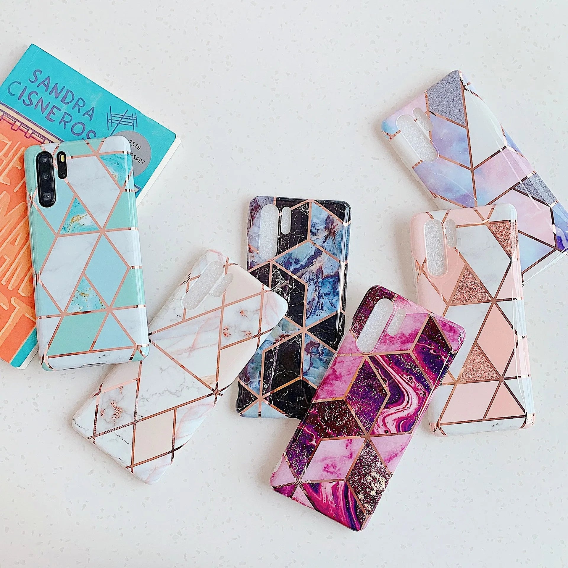 Electroplated marble patterned phone back cover case for Huawei and Samsung smartphones.