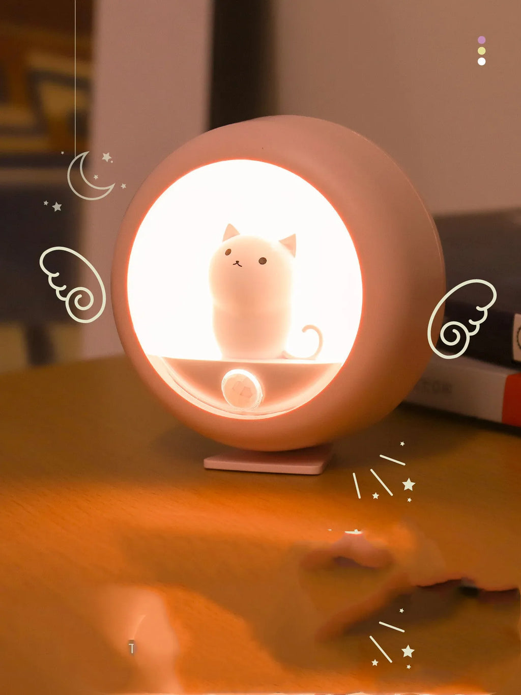 Portable bedside sleep lamp showing orange, pink and white colour options with projection feature