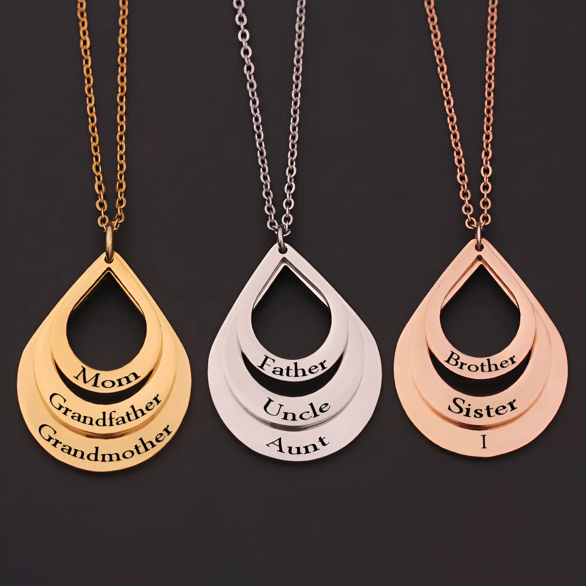 Custom engraved stainless steel pendant necklace with three water droplet design in gold, silver, and rose gold