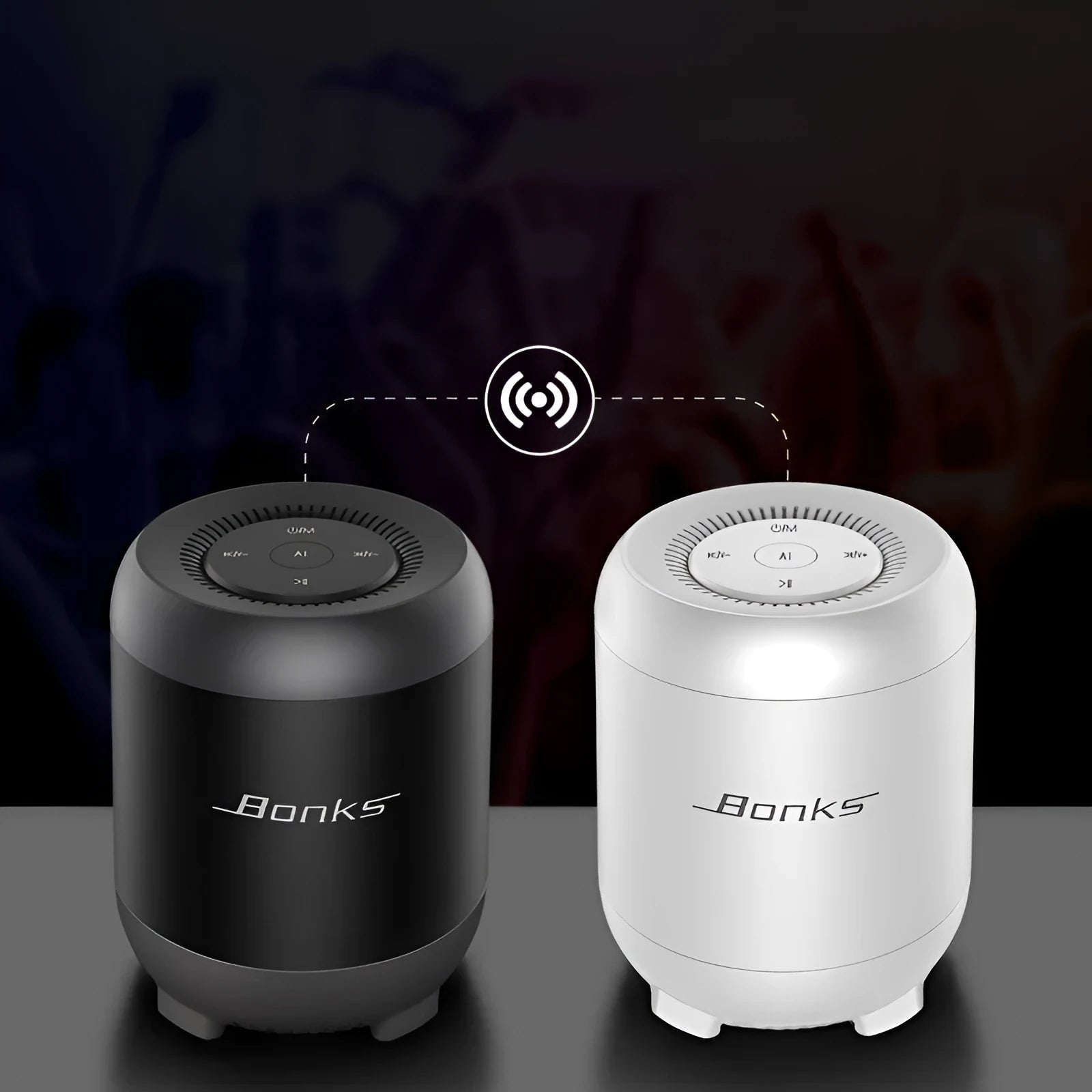 Black or white Bluetooth speaker with buttons, USB port, and AI voice control feature on Smart and Upgrade models.