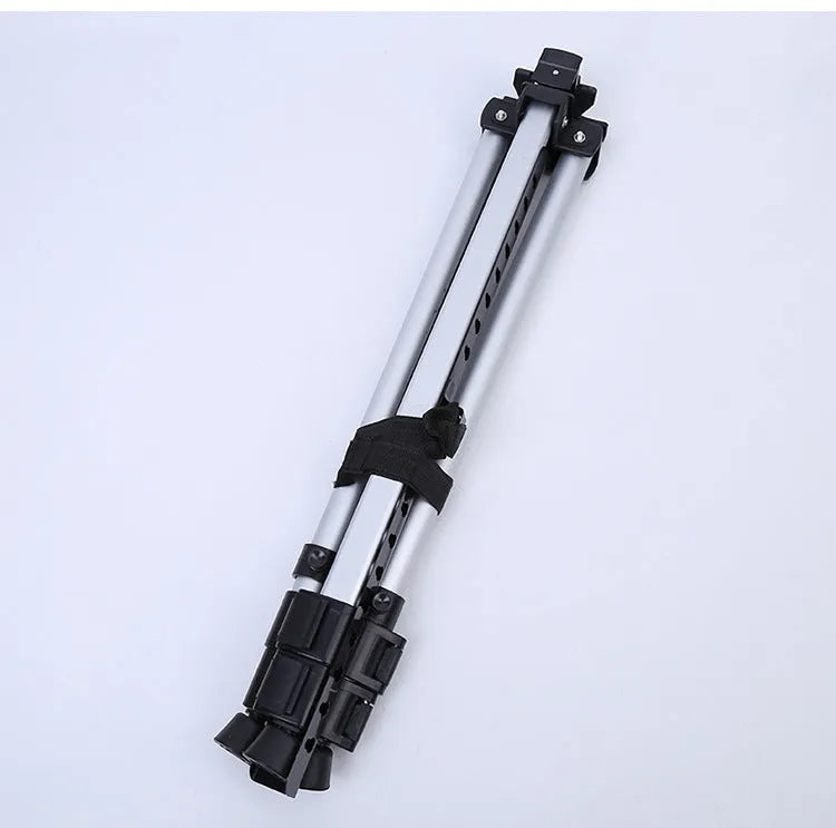 Silver aluminium alloy adjustable easel with metal tray, collapsed for table top use, next to a black nylon carrying bag