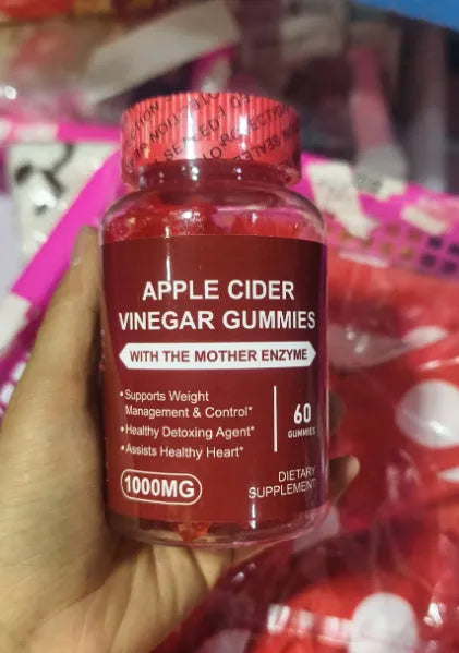 Bottle of apple cider vinegar gummies containing 60 soft candy tablets for adult nutritional supplementation