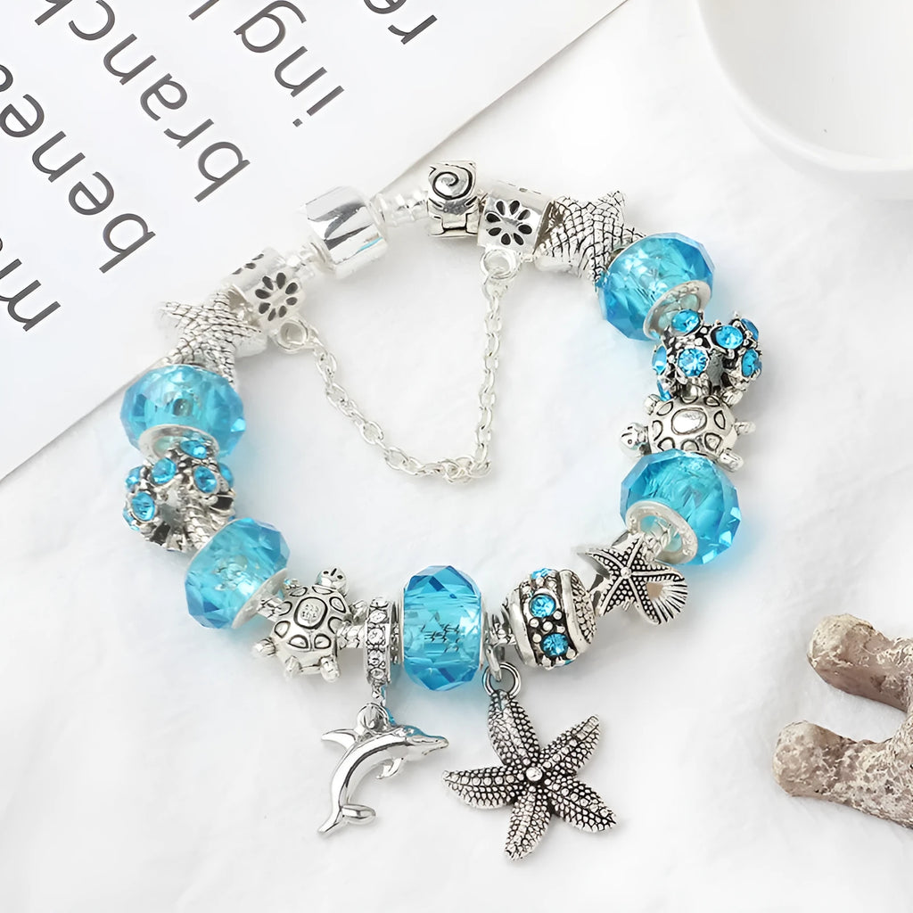 Blue Ocean alloy beaded bracelet with dolphin and starfish pendant, electroplated finish, 18 cm length option