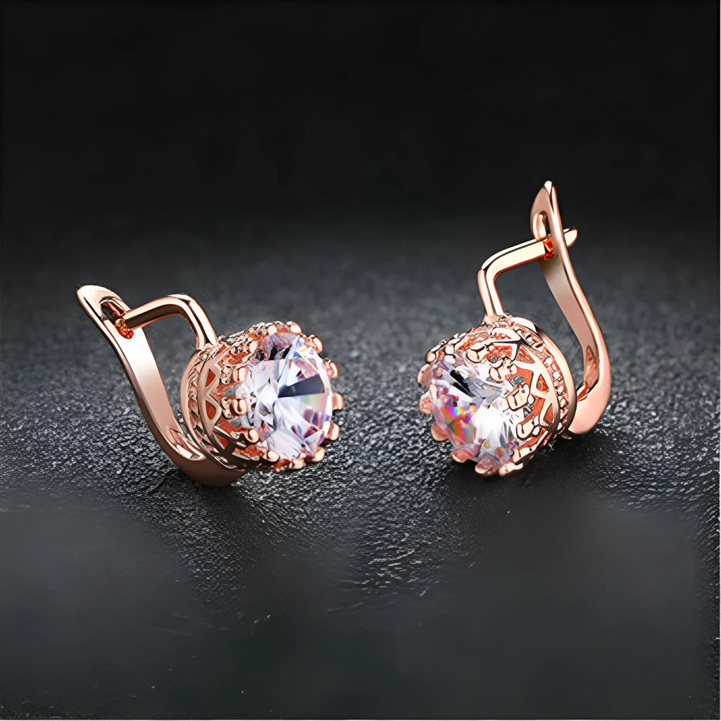 Korean retro crown-shaped ear clip earrings in rose gold or white gold colour with white diamond details.