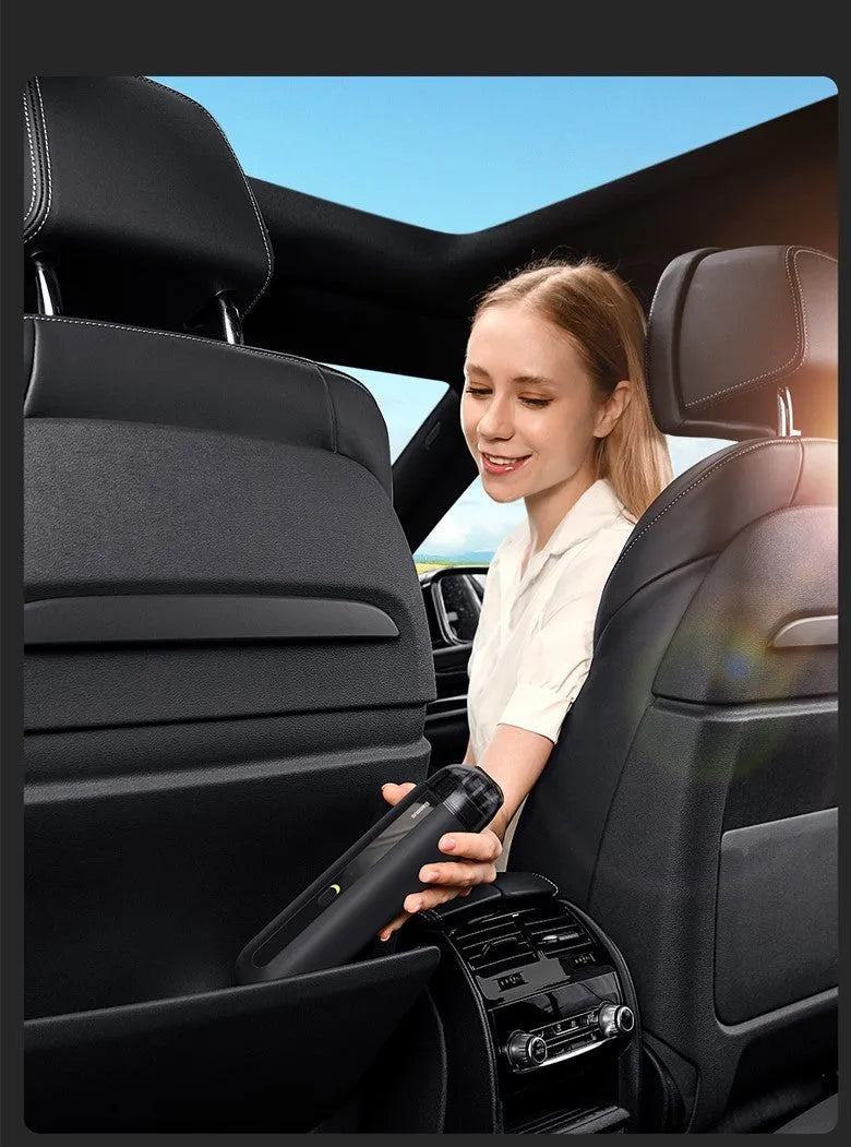 Baseus wireless handheld car vacuum cleaner in black, white, or green with blowing hose accessory.