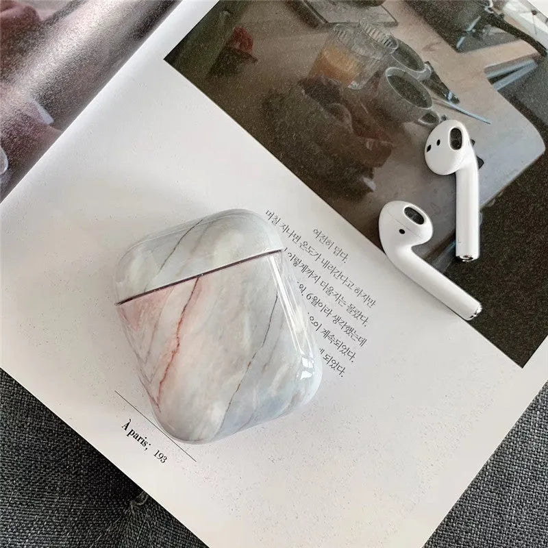 White marble pattern hard protective case for AirPods 1 and 2 wireless headphones charging box.