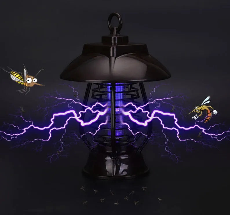 White and purple solar-powered mosquito repellent lamp for outdoor garden use.