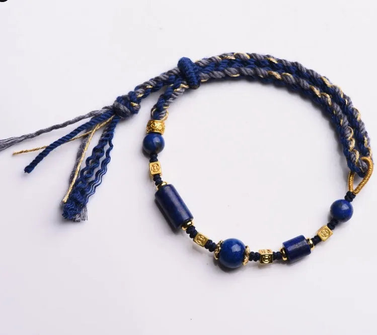Hand woven ethnic bracelet with lapis lazuli colour and rope design on flexible wire