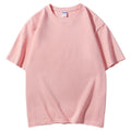 Man wearing a heavyweight 300g cotton round neck t-shirt in a loose European fit, available in multiple colours.