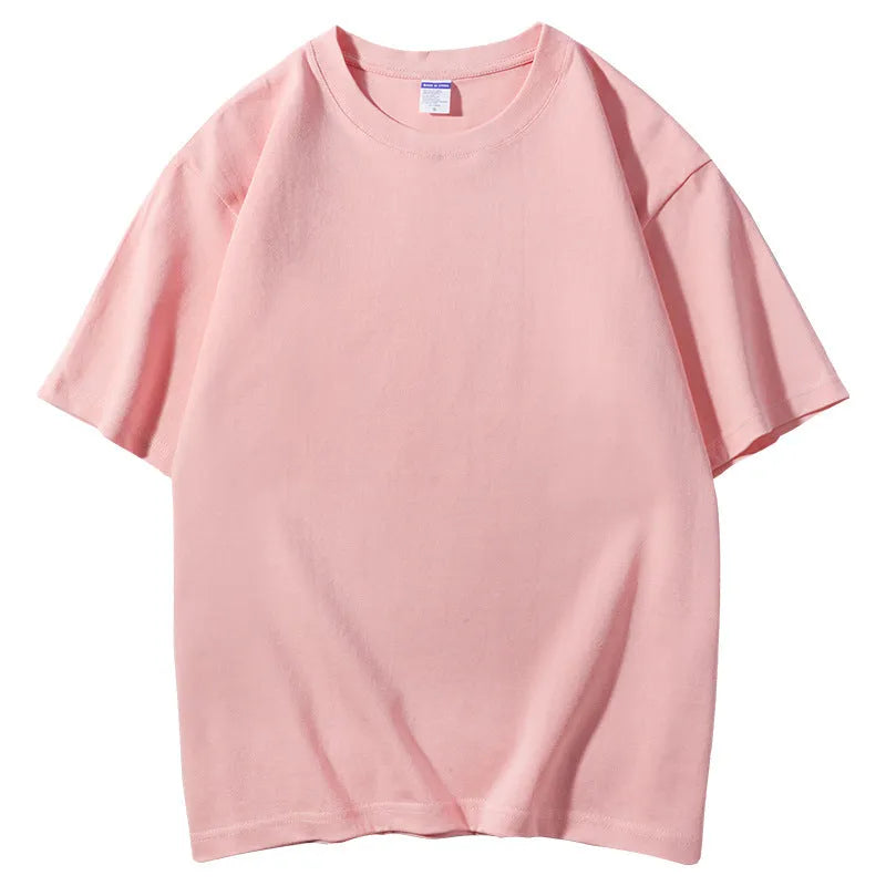 Man wearing a heavyweight 300g cotton round neck t-shirt in a loose European fit, available in multiple colours.