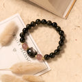 Black natural obsidian stone bead bracelet with silver kitty charm and sliding knot adjustment