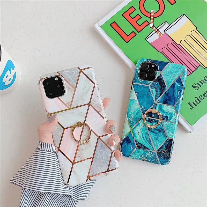 Geometric patterned purple TPU iPhone case with a silver metal ring on the back.