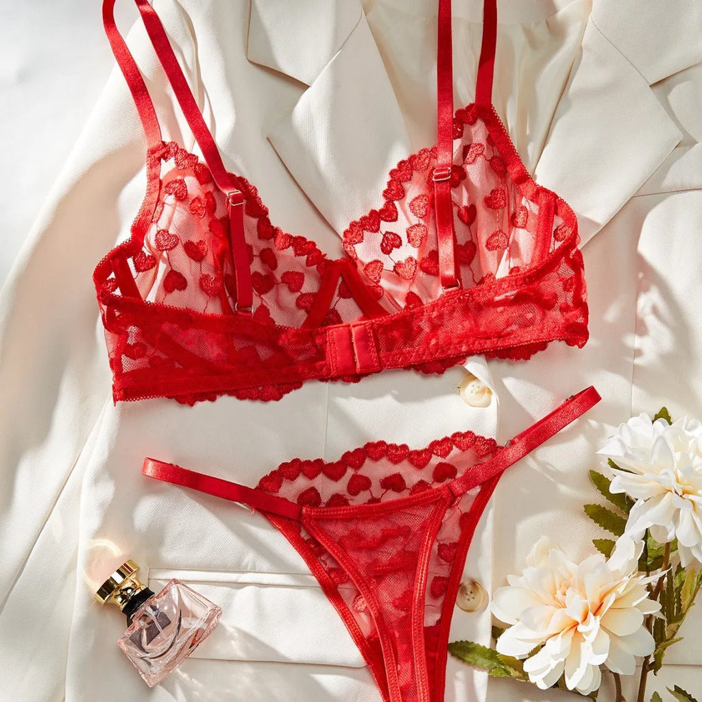 Women's red mesh suit set consisting of a long-sleeved top and slim-fit trousers