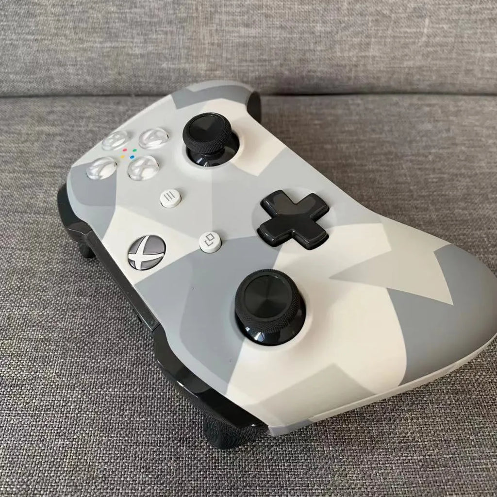 Grey wireless gamepad for Xbox One with Bluetooth connectivity and standard controller layout