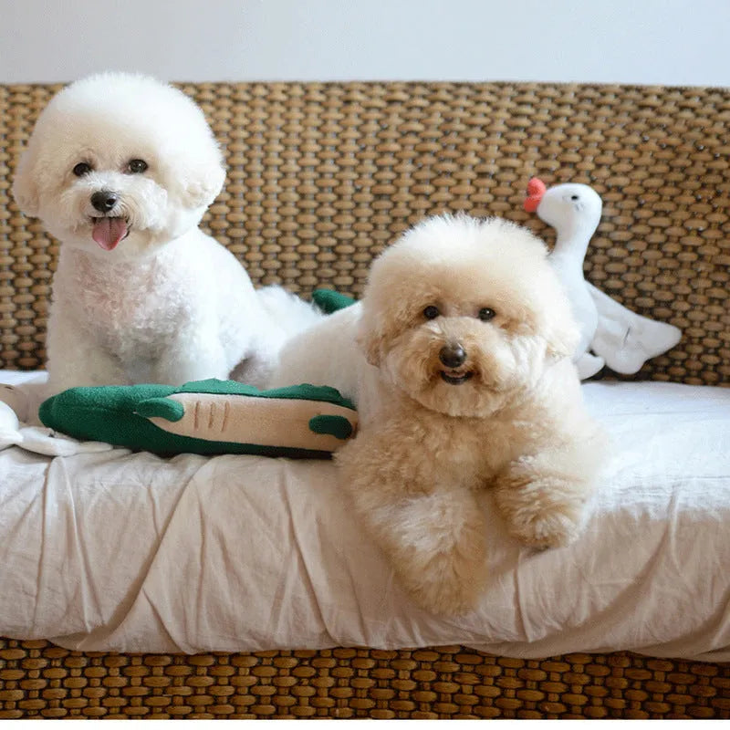 Green plush toy dog measuring 35cm long, designed as durable interactive pet toy
