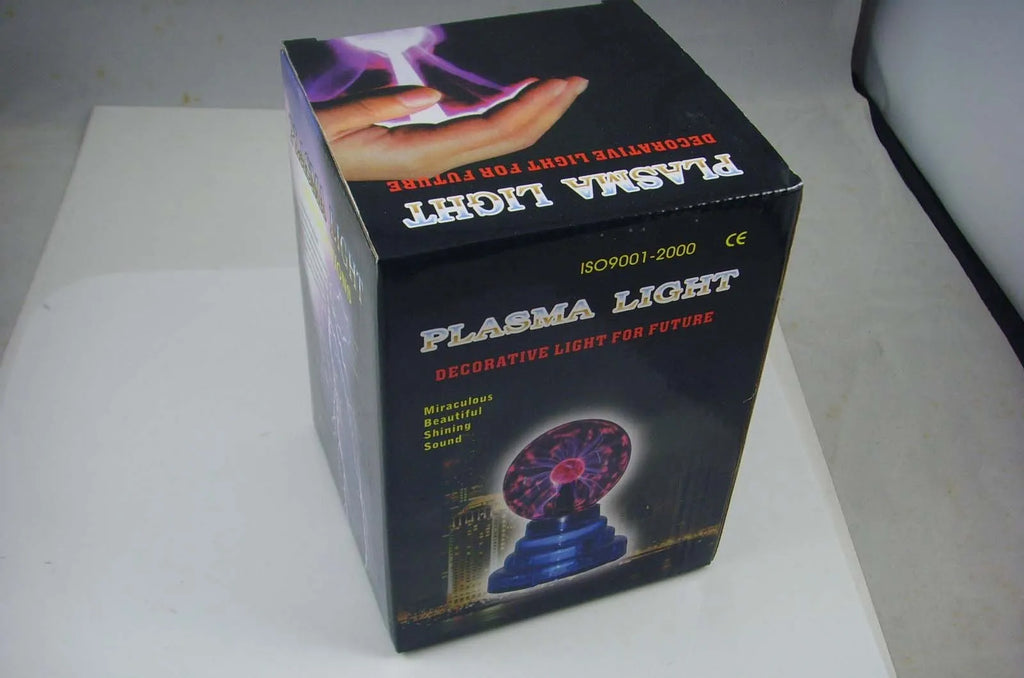 Colourful magic ball light with 7.62cm glass sphere on ABS base and USB cable