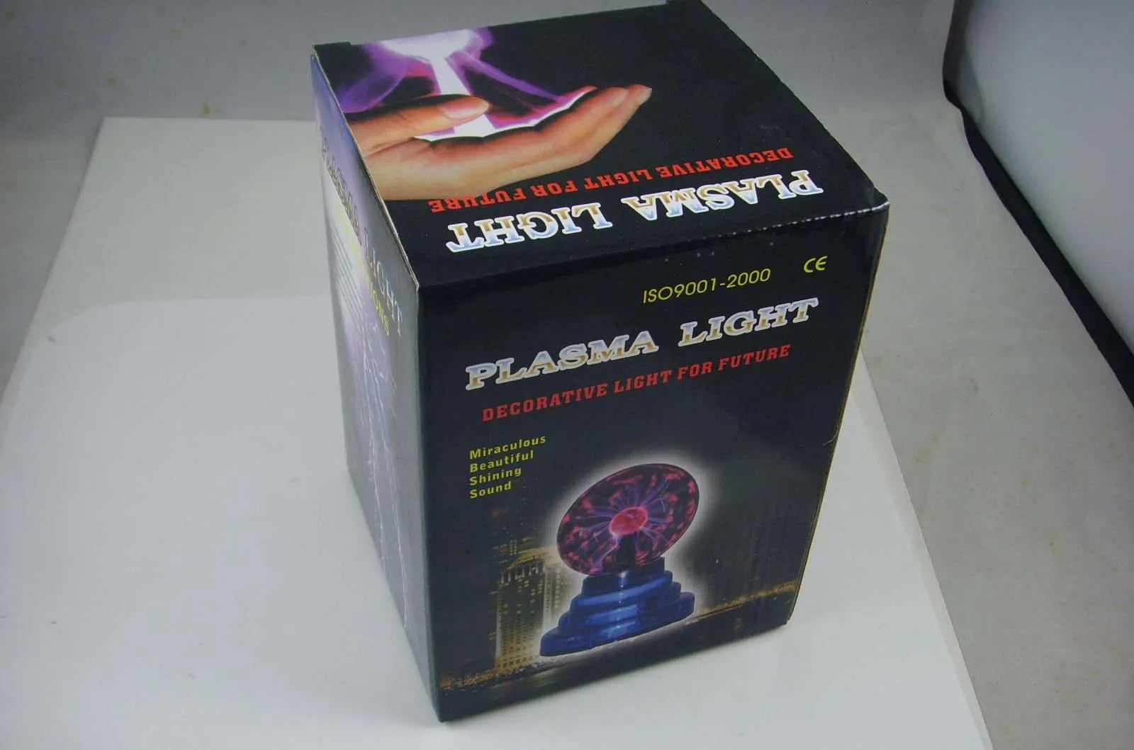 Colourful magic ball light with 7.62cm glass sphere on ABS base and USB cable