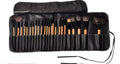 24-piece professional makeup brush set with wooden handles in a black PU gift bag.