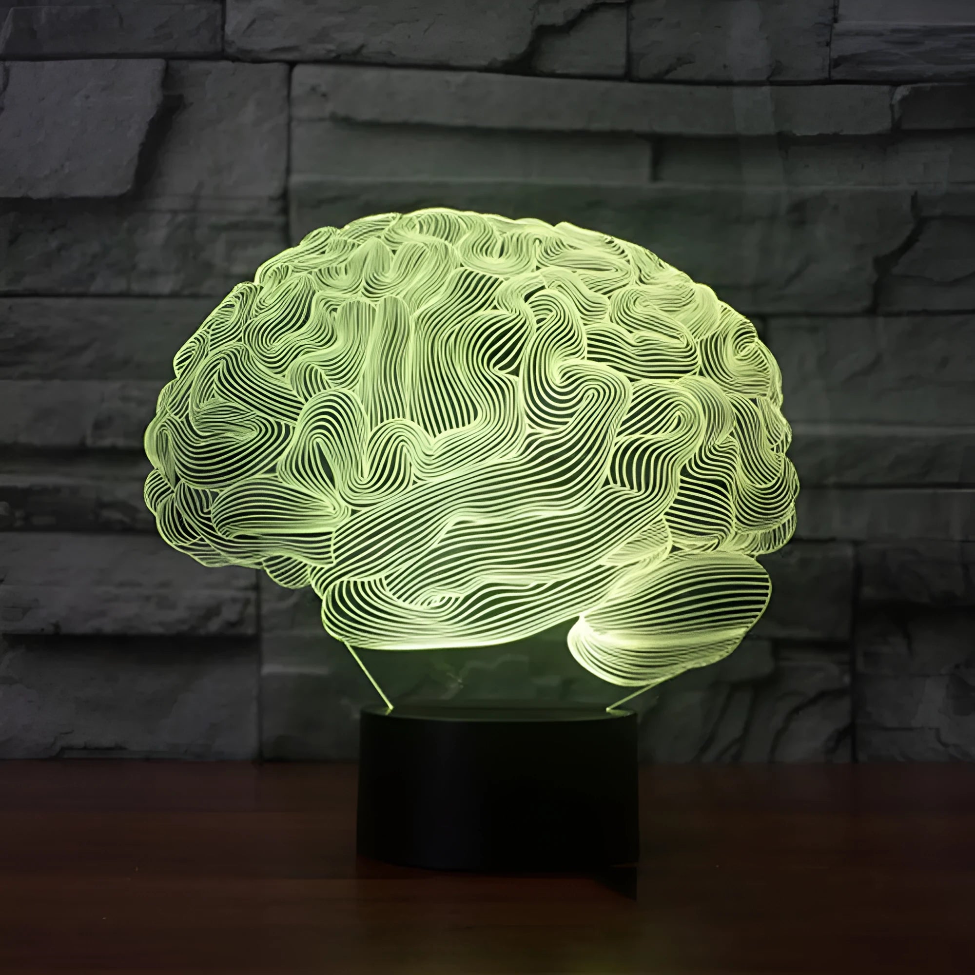 3D acrylic illusion LED desk lamp with colourful light display and remote control on a wooden surface