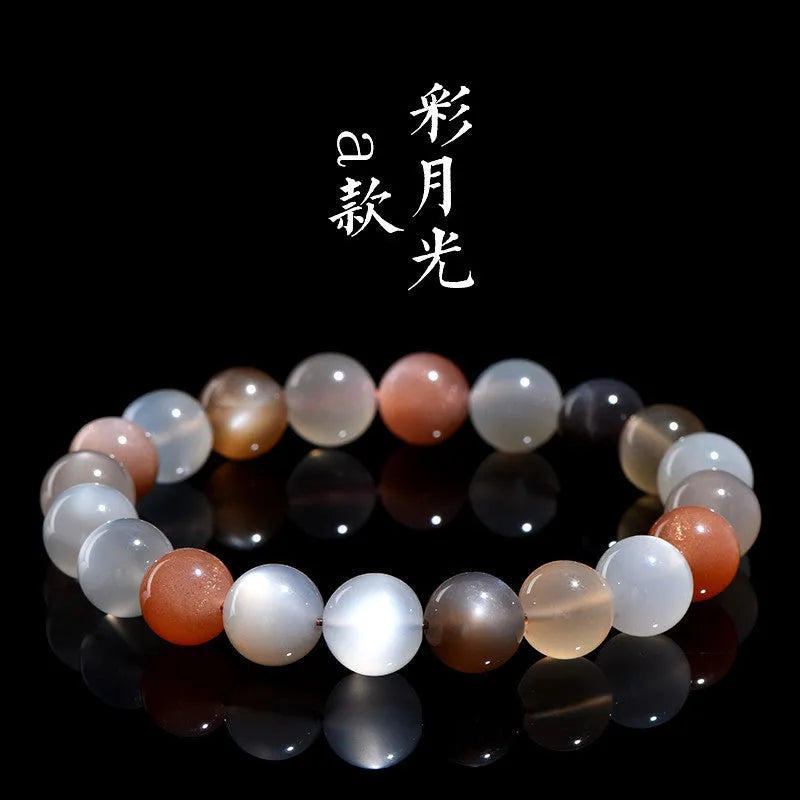 Natural moonstone Duobao bracelet with 8mm beads showcasing a colourful moonlight effect on an adjustable band.
