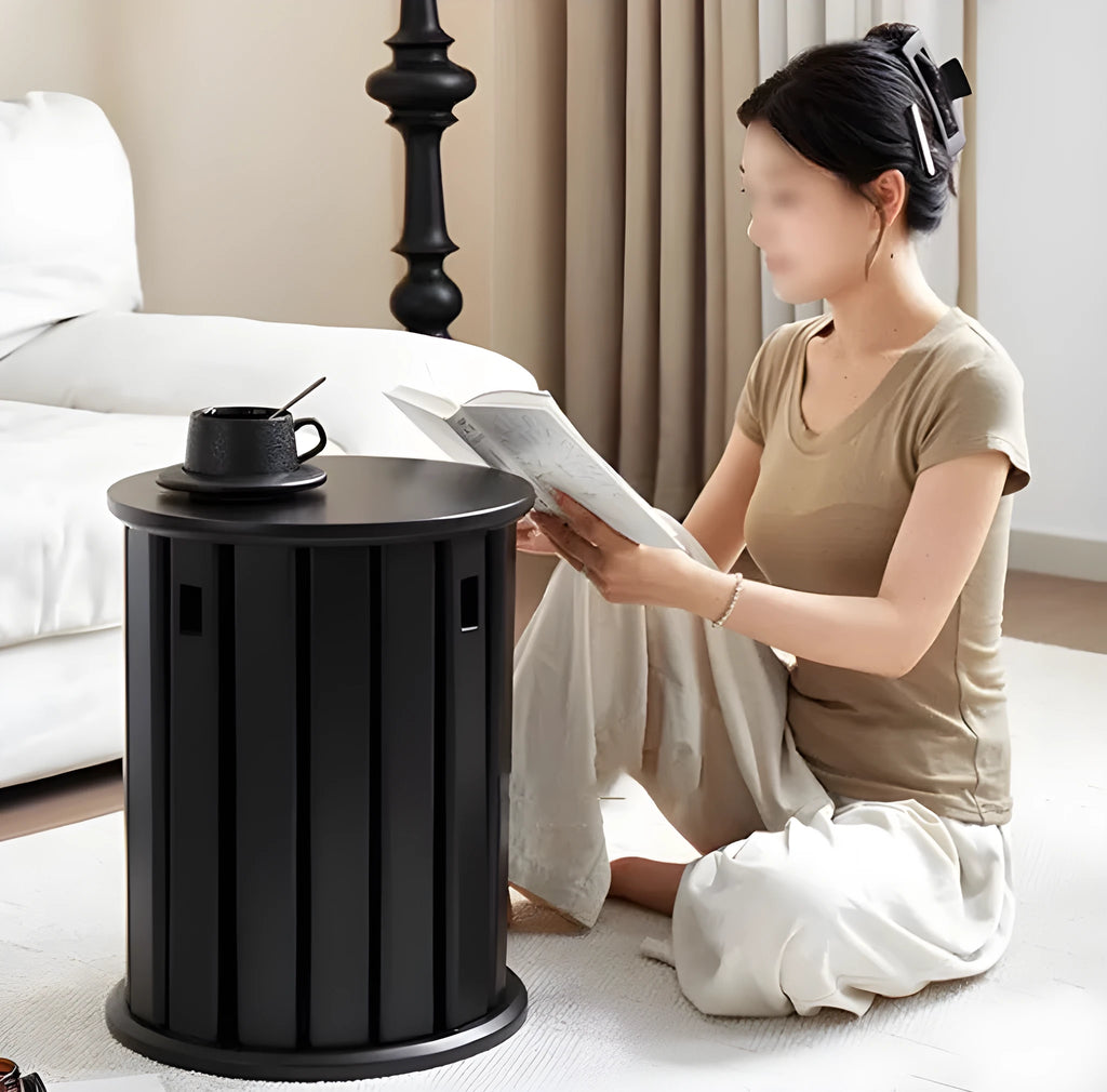 Stackable round iron dining stool in a modern style, shown in a choice of four colours.