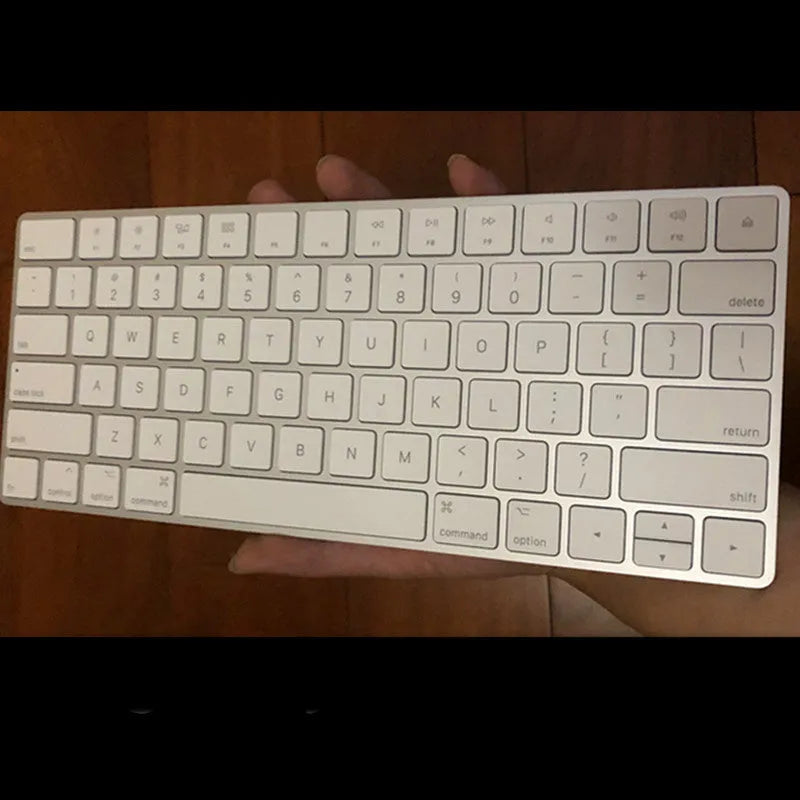 White ultra-thin metal Bluetooth wireless keyboard with multimedia function keys for Apple devices