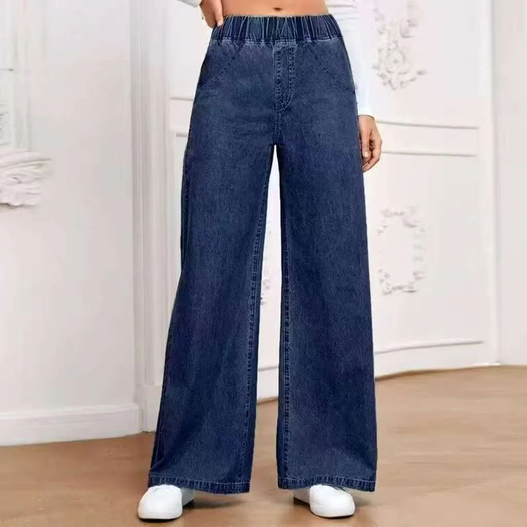 Light blue washed wide-leg denim trousers with straight cut and mid waist design