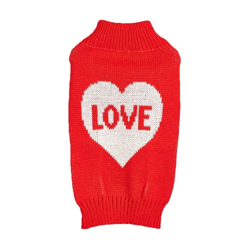 Red dog sweater with white love heart and bow design on a small dog