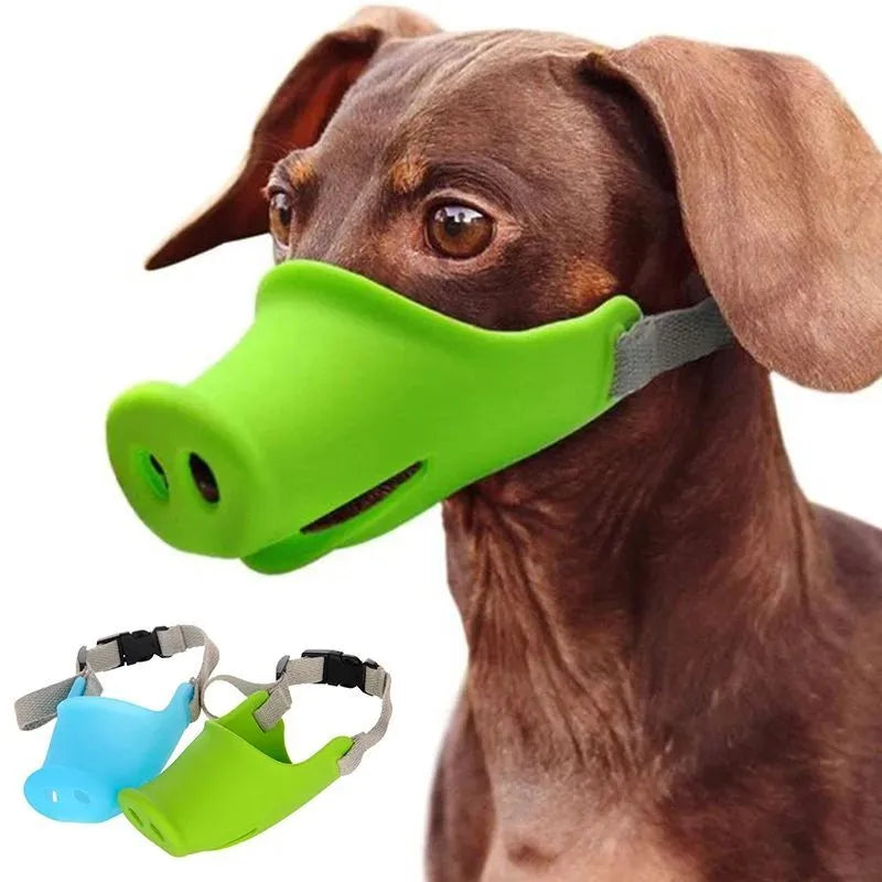 Blue and green silicone anti-bite mouth covers for dogs in two sizes on a white background.