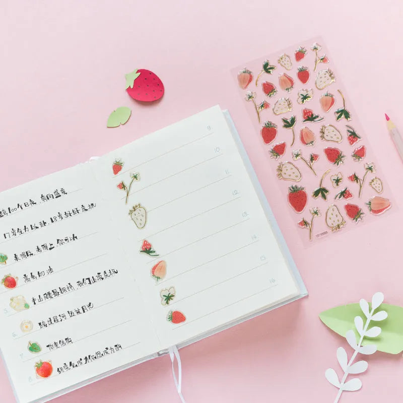 Sheet of DIY metallic gold fruit stickers including grape, orange, passion fruit, peach, pineapple, and strawberry designs.