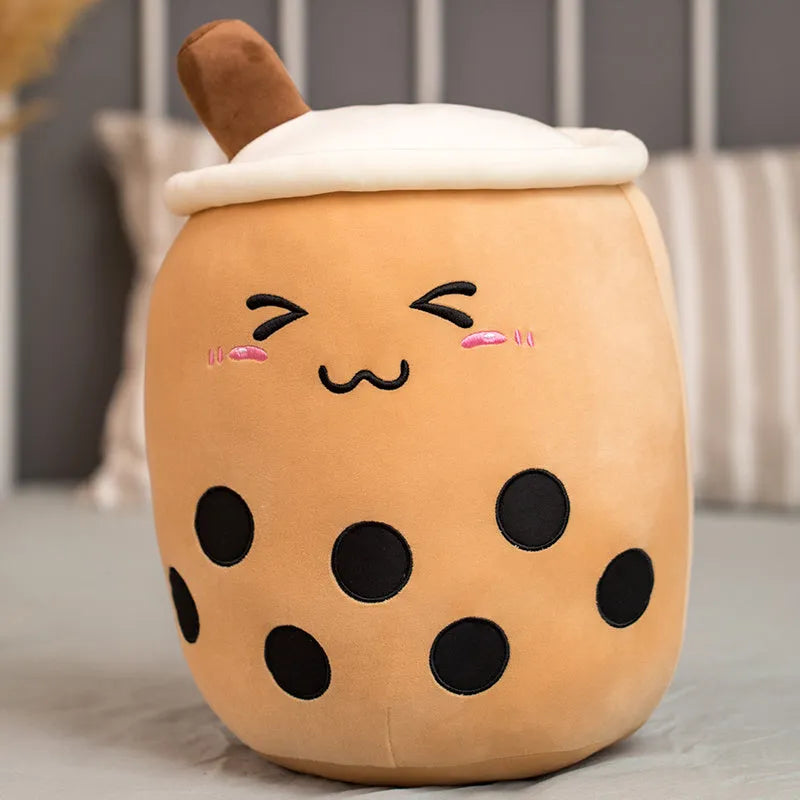 Brown and pink boba milk tea plush stuffed toy shaped like a fruit and drink cup.