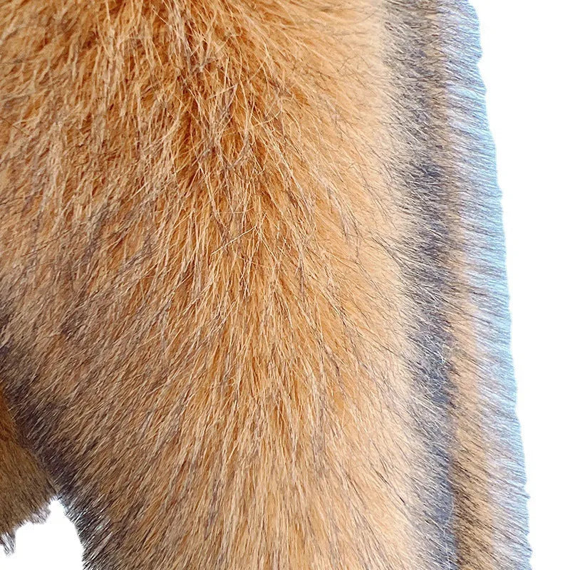 A silver grey loose-fitting mid-length artificial fur coat for women on a hanger.