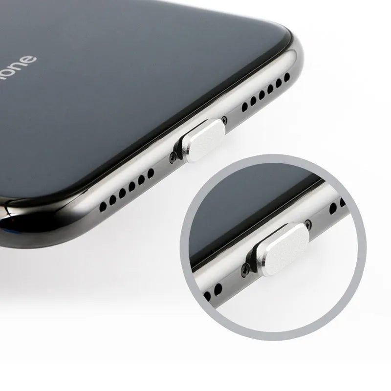 Aluminium alloy dust plug for iPhone charging port in various colours including gold and black.