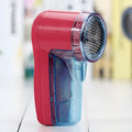 Portable electric clothing lint remover for sweaters with compact handheld design