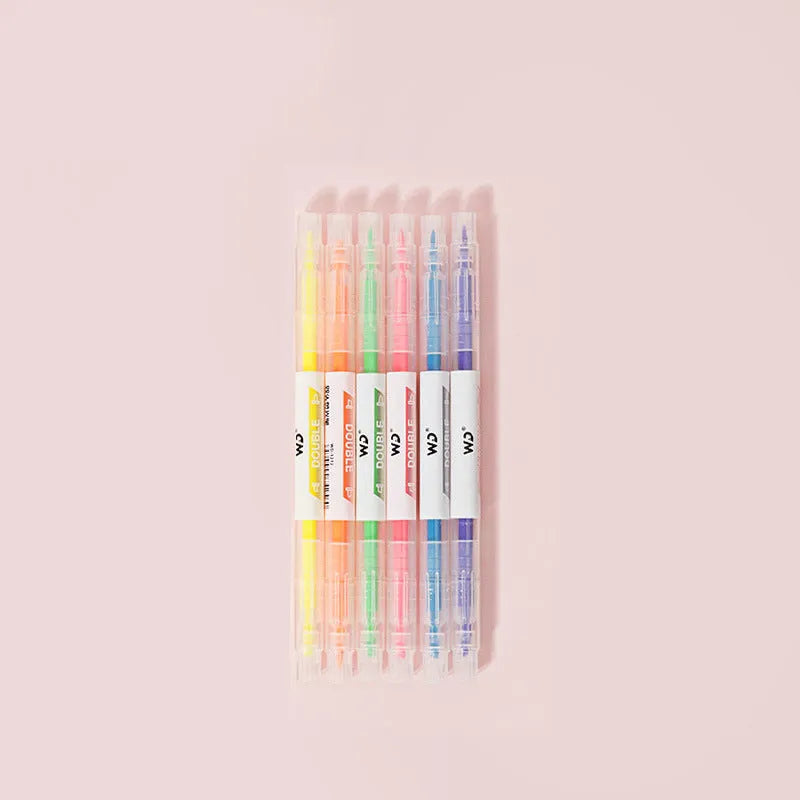 Six double-headed highlighter pens showing round and oblique tips in orange, purple, yellow, green, blue and pink colours