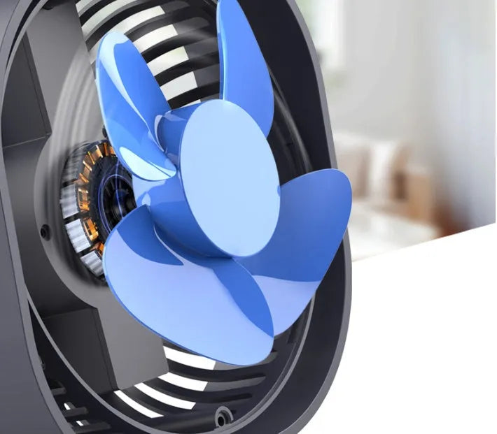 USB-powered alarm clock fan in blue with 360-degree rotating head on a desk.